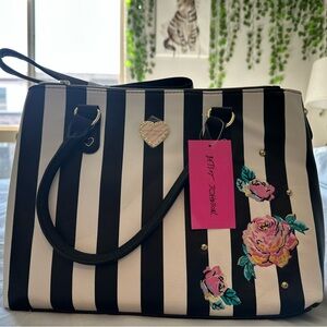 Betsey Johnson Bag! 14”x10”. NWT. Black and white striped; floral lining.
